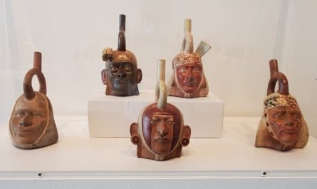 Moche clay portrait jugs