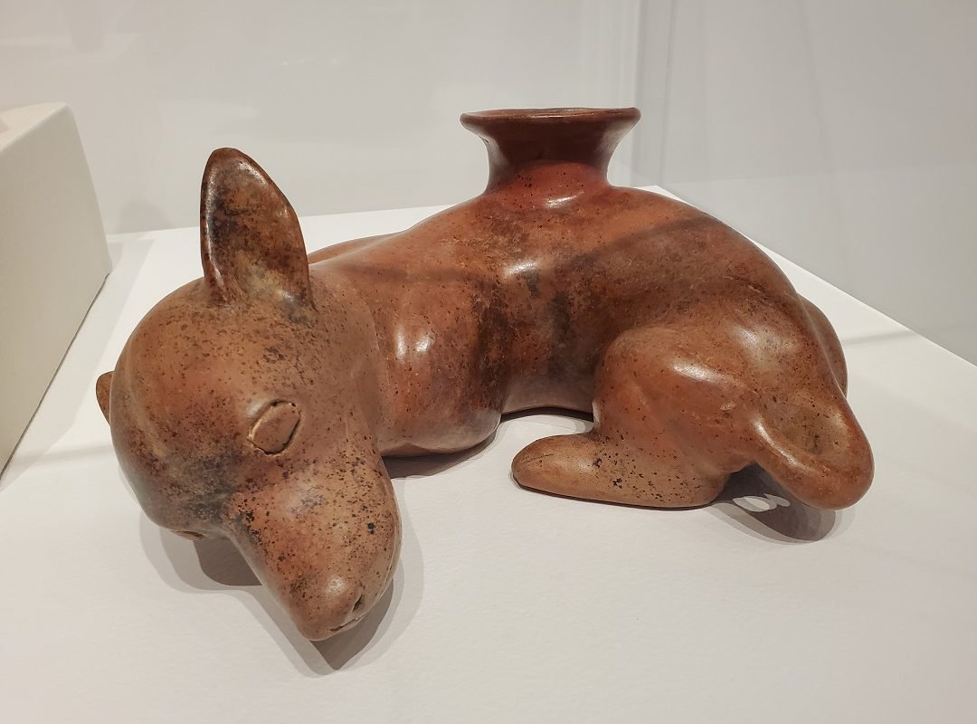 clay sculpture of dog