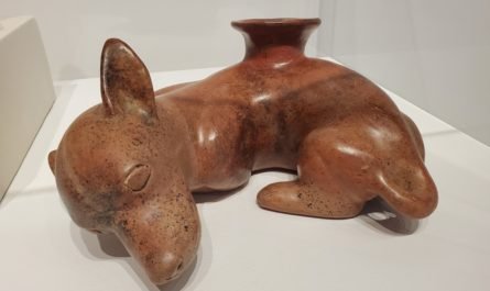 clay sculpture of dog