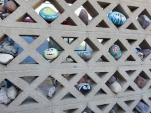 painted rocks in breeze wall Tucson Arizona