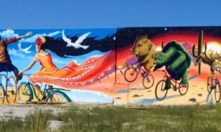 Pagac mural of cyclists in desert