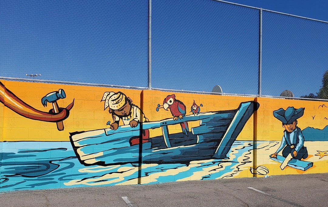 pirate and parrot fixing boat on Amphi school mural