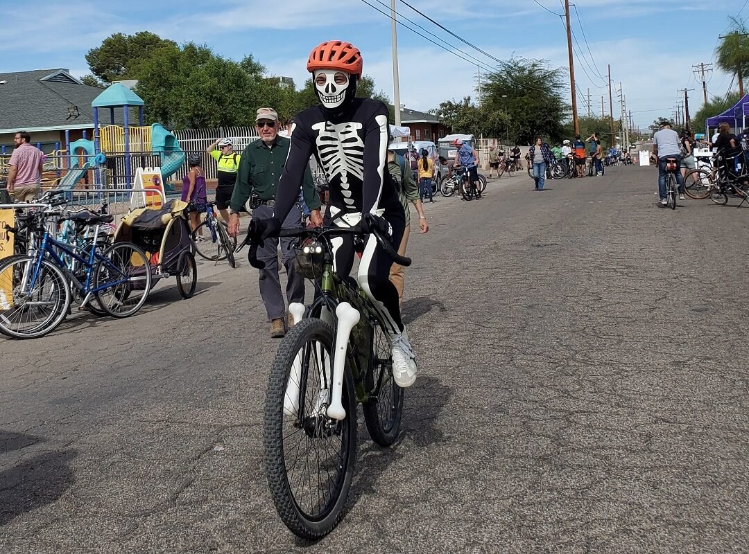 bicylist wearing a skeleton costume in Cyclovia