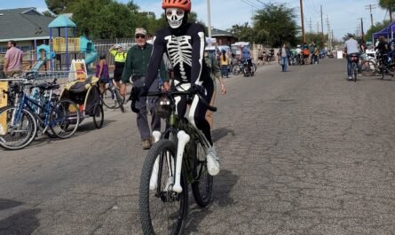 bicylist wearing a skeleton costume in Cyclovia