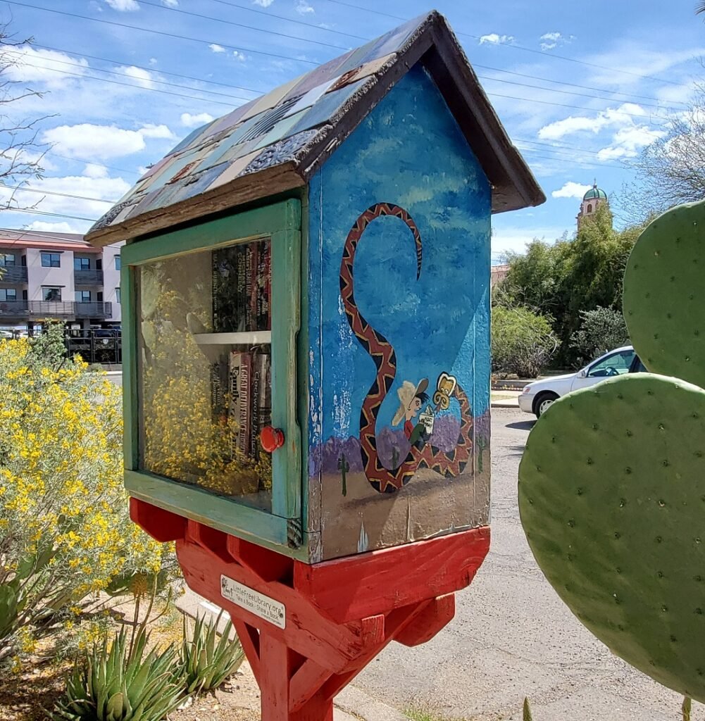 Hiss story painting on Little Free Library