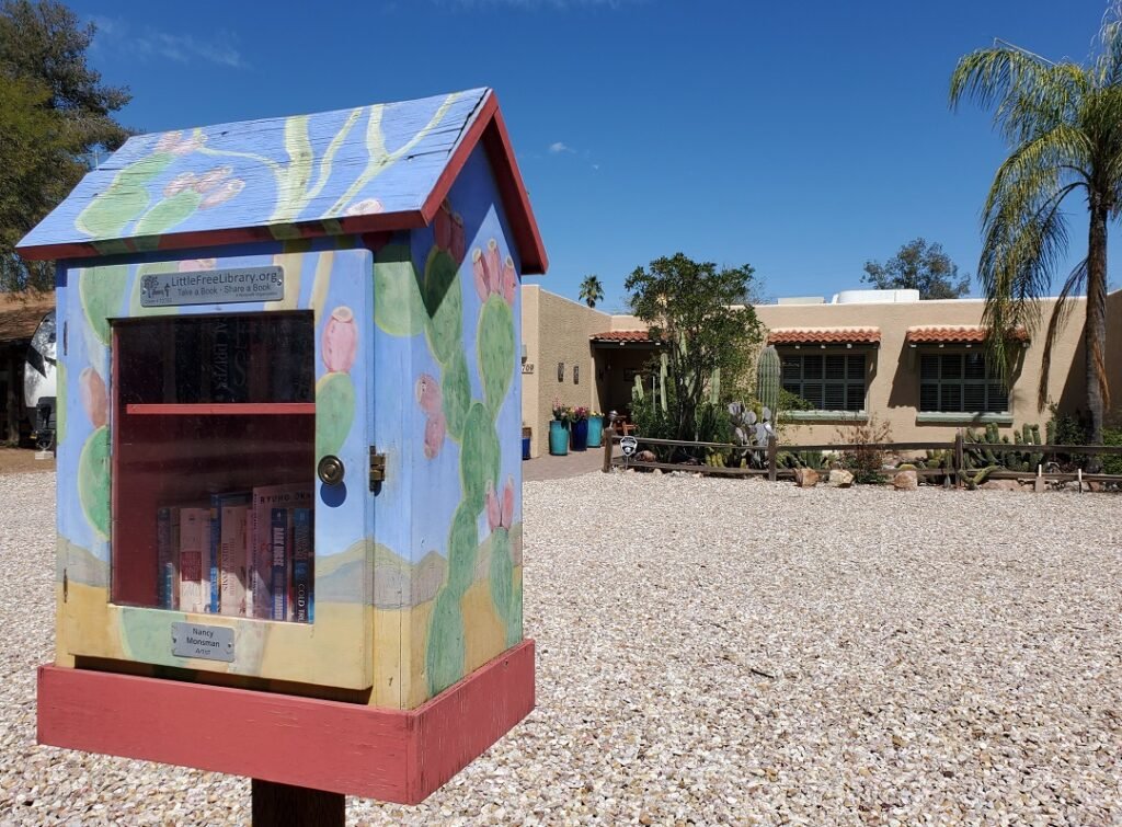 Litte Free Library with prickly pear cactus artwork in Midtown