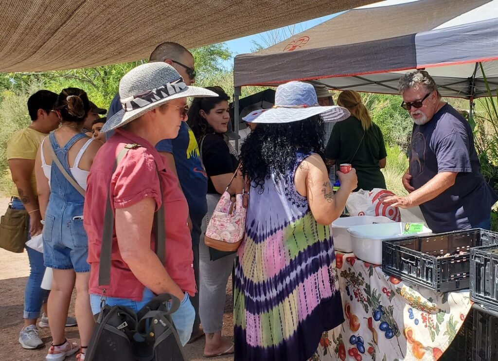 vendor selling garlic at Tucson Garlic Festival