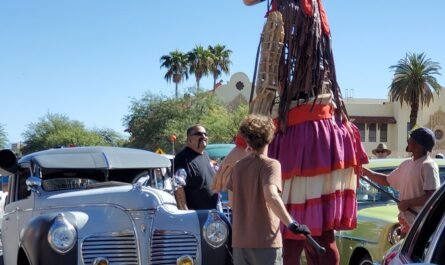Amal the puppet greeted by lowriders in Tucson