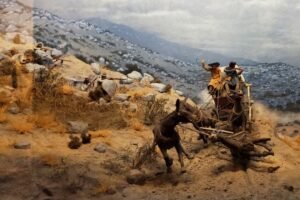 diorama of stagecoach being attacked