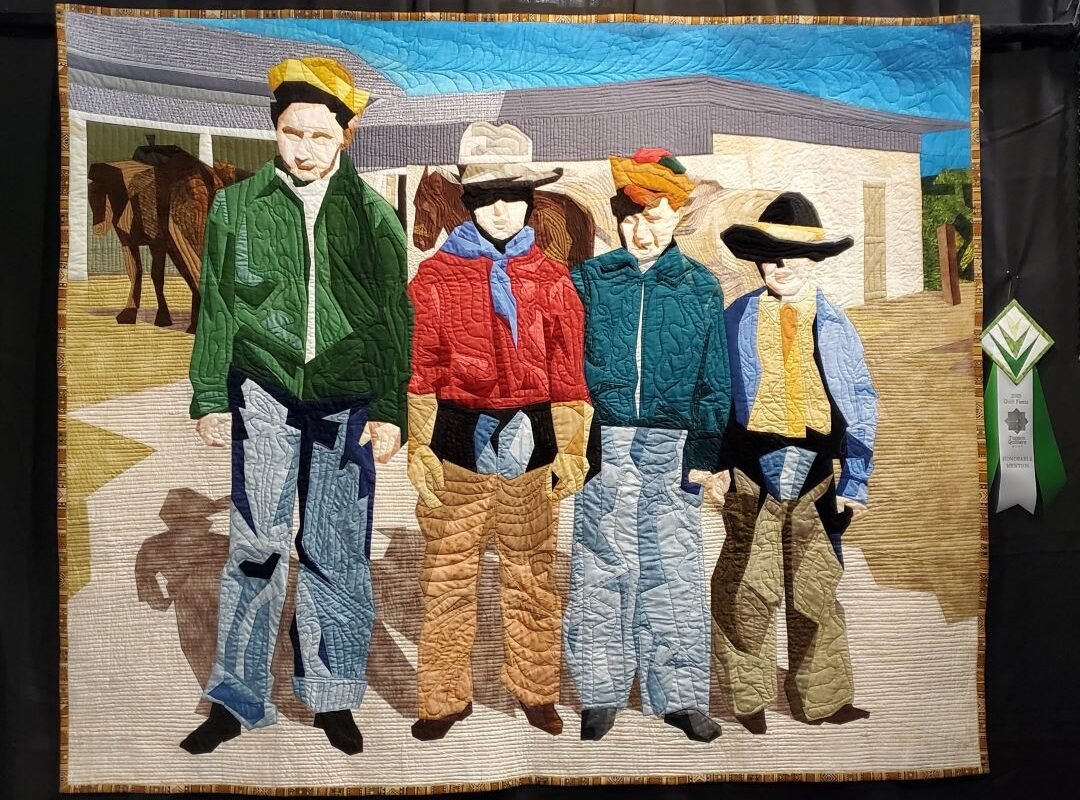 quilt portrait of children wearing cowboy clothes