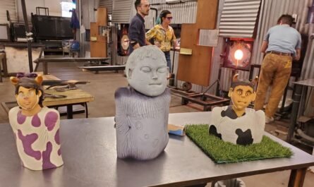 three glass figures by Danny White artist