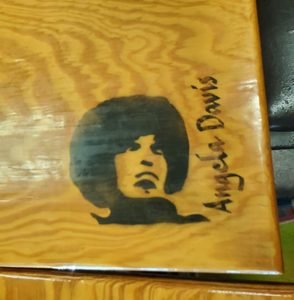 Angela Davis table at Revolutionary Grounds
